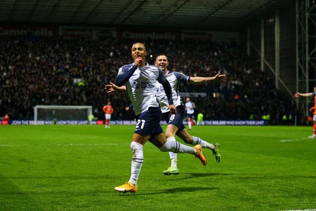 Preston North End's Cameron Archer taunts the Blackpool fans after scoring the opening goal