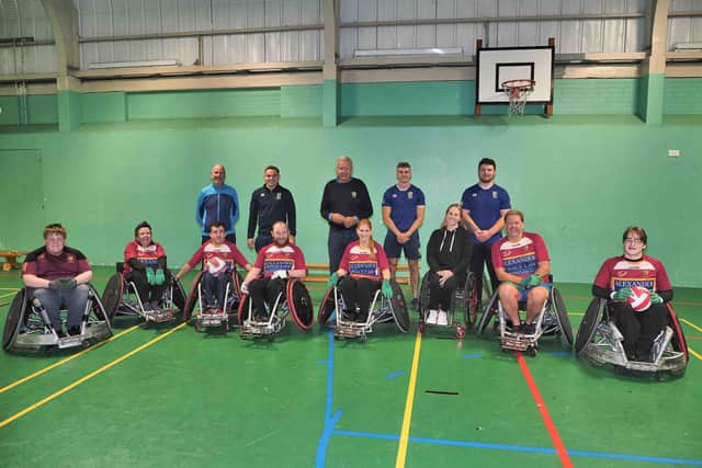 Sir Bill Beaumont, Caroline Wareing (Wareing Buildings), Jason Gorner (J&M Cars) and participants from The Fylde Rugby Community Foundation Wheelchair Rugby Team.