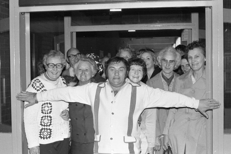 Les Dawson holds back the crowds at the Freezex '78 exhibition at Preston's Guild Hall