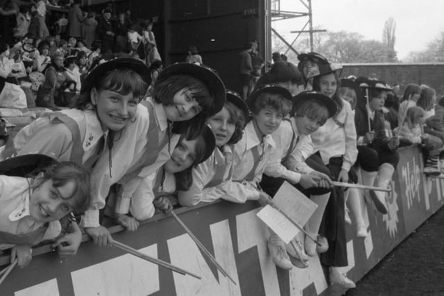 One thousand Lancashire brownies and guides formed a vivid symbolic backcloth to the diamond jubilee celebrations of the guiding movement The 60 year celebrations at Preston North End's football ground marked the growth of the area's guiding movement from 500 members at the birth of 1917 to the present 13,000. About 8,000 guides, brownies and rangers were present. Pictured are some of the Blackpool girls who gave a demonstration of old Lancashire dances