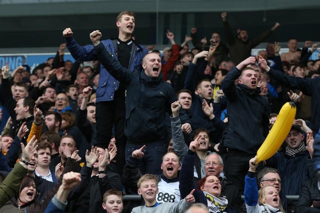 Preston North End fans celebrate their team's last minute goal