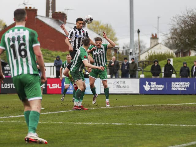 Chorley's Adam Henley heads home against Blyth Spartans (photo: David Airey/dia_images)