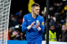 Freddie Woodman applauds the travelling supporters at the end of the match