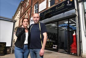 Jina and Jehad outside their new shop in Lancaster Road.