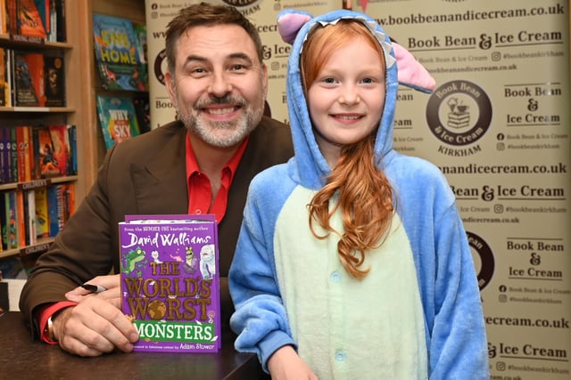 LANCASHIRE POST - BLACKPOOL - 15-07-23  Celebrity, comedian and children's author David Walliams promotes his new book, The World's Worst Monsters, at Book Bean and Ice Cream, Kirkham, where he met excited fans and their parents, signed booked and posed for photographs.