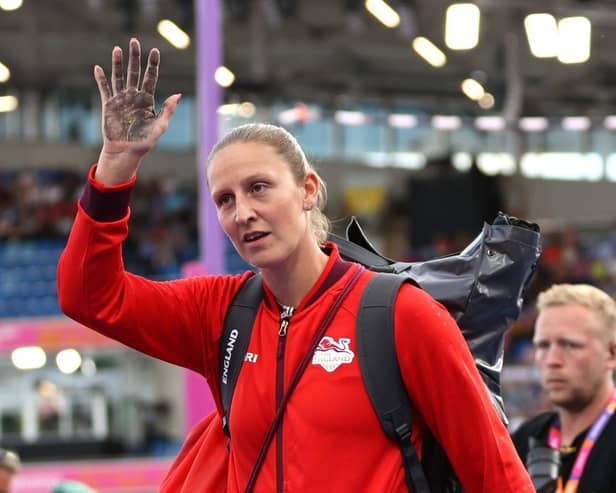 Holly Bradshaw of Team England waves to the crowd after withdrawing from the Women's Pole Vault Final (Photo by Michael Steele/Getty Images)