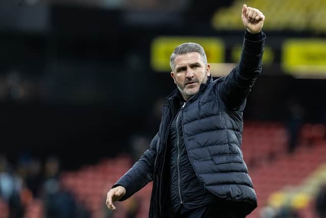 Preston North End's manager Ryan Lowe salutes his side's travelling supporters at the end of the match
