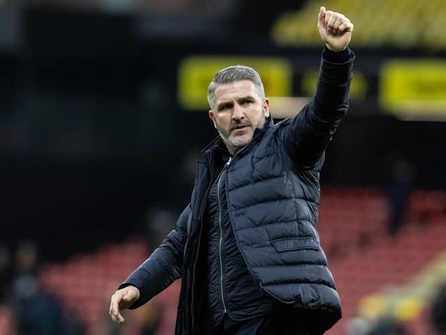 Preston North End's manager Ryan Lowe salutes his side's travelling supporters at the end of the match
