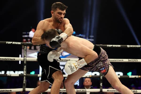 Jack Catterall (left) in action against Josh Taylor last February