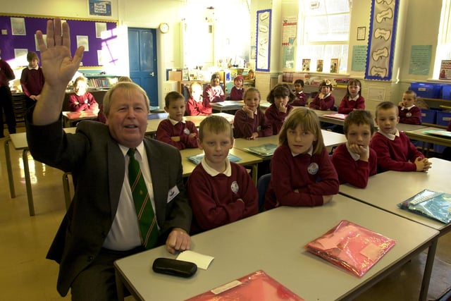 Lancashire County Council cabinet member for education and young people, Alan Whittaker, answers the questions with year 3 and 4 during his visit to Fishwick County School in Preston