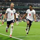 Harry Kane #9 of England celebrates with Jude Bellingham #10 after converting a penalty for his team’s third goal during the FIFA World Cup 2026 Round of 16 match between Mexico and England at Mexico City Stadium on July 05, 2026 in Mexico City, Mexico. (Photo by Charlotte Wilson/Getty Images)
