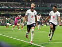 Harry Kane #9 of England celebrates with Jude Bellingham #10 after converting a penalty for his team’s third goal during the FIFA World Cup 2026 Round of 16 match between Mexico and England at Mexico City Stadium on July 05, 2026 in Mexico City, Mexico. (Photo by Charlotte Wilson/Getty Images)