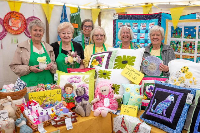 Pictured (from left) Ruth Ashcroft, Phil Hatch, Carole Mitson, Margaret Knight, Christine Poulter and Margaret Shaw at a stall at the fete.

Yellow Ribbon Day fete at St Catherine's hospice