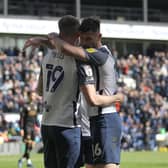 Preston North End striker Emil Riis celebrates with Andrew Hughes after opening the scoring against Queens Park Rangers at Deepdale