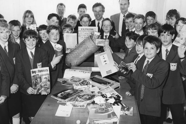 Pupils pack a time capsule at GEC, Preston, watched by Fylde MP Michael Jack Lifestyle in the 1990s was captured forever by pupils ar Carr Hill High School, who made up a time capsule, which was buried in the school grounds.
Contained in the special flask, made by GEC Plastics, are items telating to 1990 - including books, photographs, food packets, guide to the Fylde and a copy of the Lytham St Annes Express.
The capsule was to have been opened by pupils at the school in 2010