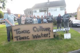 Some of the Earls Way residents protesting about the polluted water