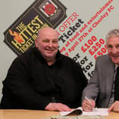 Chorley FC chairman Ken Wright and secretary Graham Watkinson sign the lease for the club's ground 