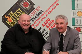 Chorley FC chairman Ken Wright and secretary Graham Watkinson sign the lease for the club's ground 