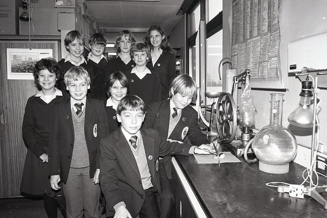 These young Einsteins proved their genuis in a nationwide science scheme. The children from Walton-le-Dale High School, near Preston, gave up their dinner time breaks to work in the school's laboratory. And their hard work paid off when they all won bronze awards in a new national young boffins programme being run by the British Association for the Advancement of Science