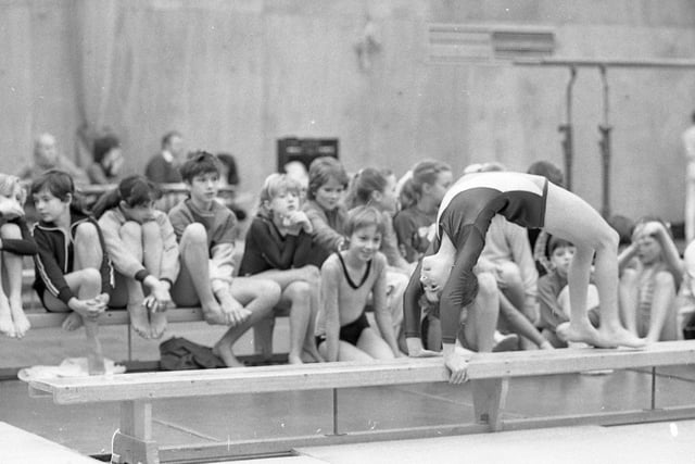 Members of Penwortham Gymnastic Club watch a competitor in their seventh annual competition
