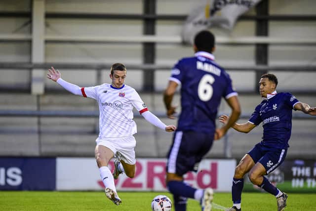 Charley Jolley pulls the trigger to score Fylde's first goal of the game (photo: Steve Mcllelan/AFC Fylde)