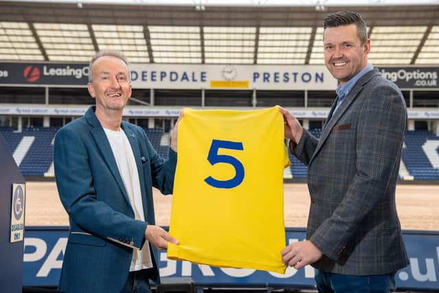 Kevin McGuiness (left) hands over Mick Baxter's Preston North End shirt to Ross Baxter at Deepdale. Pic: Ian Robinson/PNEFC