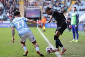 Preston North End's Jayden Meghoma takes on Coventry City's Milan van Ewijk (photo: Shaun Brooks/CameraSport)