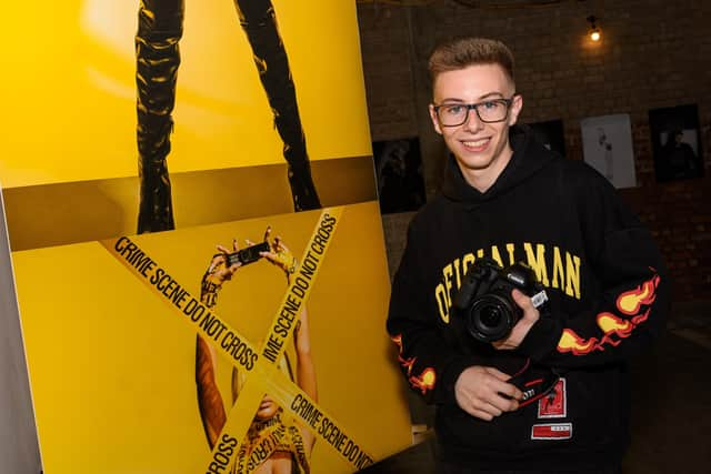 Josephy Frankitt-Kennedy in front of some of his work at the HIVE exhibition. Photo: Kelvin Stuttard