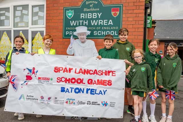 The Lancashire School Games baton arrives at Ribby-with-Wrea from Kirkham Grammar Picture: SAM FIELDING