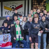 Jack Sampson, centre, is pictured with the fans of Chorley and Farsley Celtic on Saturday (photo: David Airey/dia_Images)
