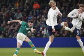 Alan Browne, left, scores his side's goal during the international friendly soccer match between Ireland and Norway at the Aviva Stadium