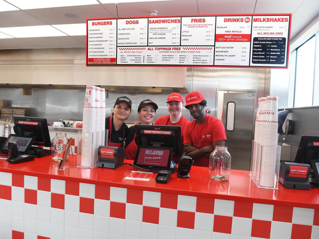 The restaurant's first customers were greeted with warm smiles during its opening day.