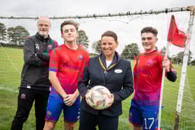 From L to R Coach Peter Roberts with players Nathan Heron and James Metcalfe plus Bellway's sales advisor Leanda