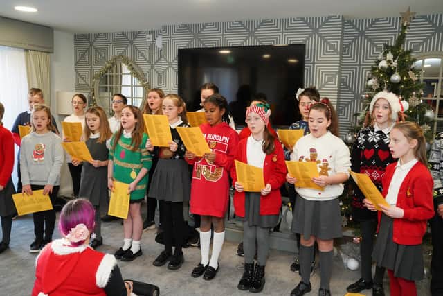 Leyland Methodist School sing carols to homeowners at McCarthy Stone's Balshaw Court.