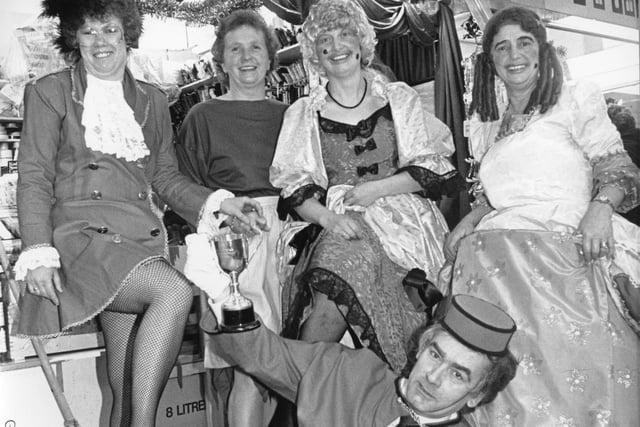 Cinders and Santas were the winners in a annual competition to bring Christmas cheer to Preston's Indoor Market. Winners of the 1988 contest were: Edward Starr, Norma Baines, Dorothy Campbell, Margaret Ashton and Betty Whiteside