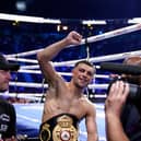 Jack Catterall celebrates victory alongside trainer Jamie Moore and promoter Eddie Hearn. Picture: Dave Thompson/Matchroom Boxing
