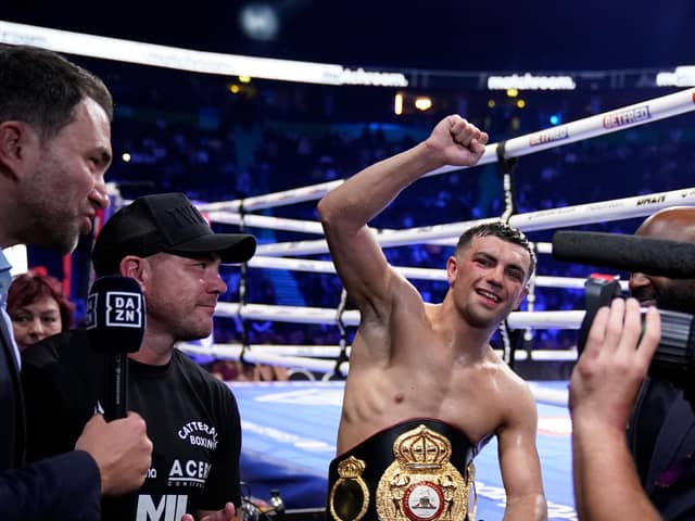 Jack Catterall celebrates victory alongside trainer Jamie Moore and promoter Eddie Hearn. Picture: Dave Thompson/Matchroom Boxing