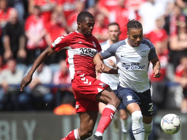 Preston North End striker Cameron Archer takes on Middlesbrough's Anfernee Dijksteel at Deepdale