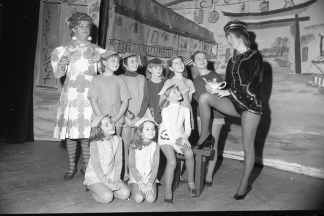 It wasn't just the genie that came out of Aladdin's lamp for Louise Male (far right). For the 28-year-old is looking forward to a bright 1981 thanks to her success in Preston Drama Club's Christmas panto. Some of the children's chorus and dancers and pictured with Louise, alongside the dame, Widow Twankey, played by Don Stephenson