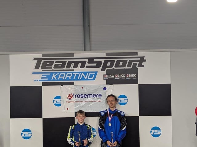 Cadet rising star winner Harry S and junior rising star winner Dayner with their awards
