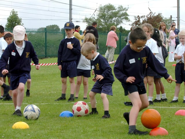 Showing off their ball skills during the sports day for infants at Fulwood and Cadley Primary School