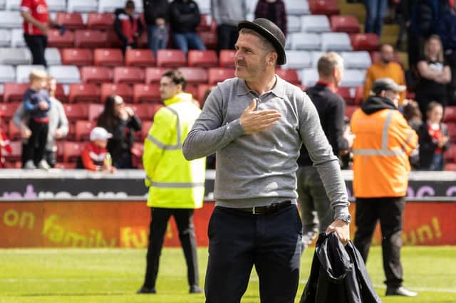 Preston North End's manager Ryan Lowe wearing a bowler hat 