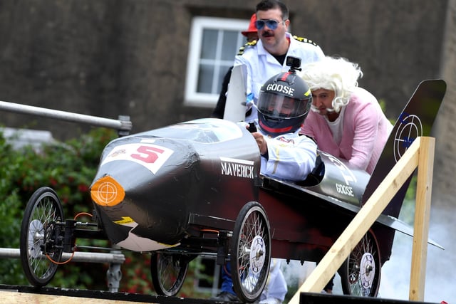 A helping hand getting started at the Longridge Soap Box Derby.