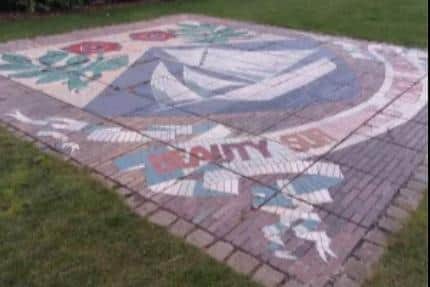 The Morecambe Coat of Arms Mosaic, featuring Morecambe's famous motto "Beauty Surrounds, Health Abounds" will be illuminated by the Morecambe Sparkle CIC team.