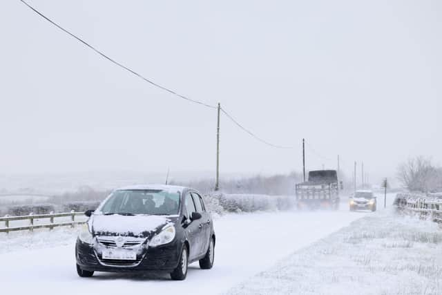 The roads in Armoy this morning proved difficult to pass with heavy overnight snow and ice.

As sub-zero temperatures swept across Northern Ireland overnight, warnings are in place for drivers to take care on roads.

Monday was a bitterly cold evening, with snow and ice taking hold from late afternoon.

The north west has been particularly badly hit.

Police in Derry said they dealt with 19 crashes in the city as well as city, Strabane, Slaughtmanus and Donemana.

"If you are driving, please slow down and keep a safe distance from the vehicle in front of you," police said.

A number of schools have also been closed.
Photo Stephen Davison/Pacemaker Press