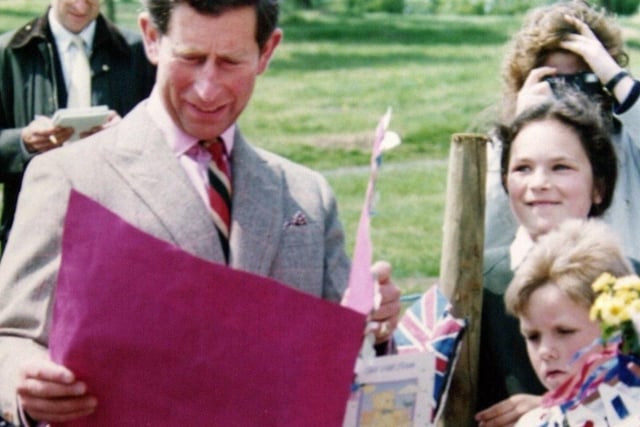 Prince Charles receives a get well card for Prince William from pupils of the former St Saviour's Primary School in Bamber Bridge in 1991