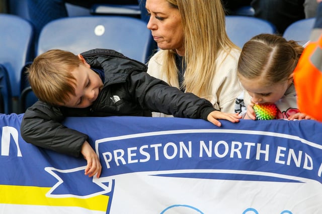 Preston North End fans watch their team in action