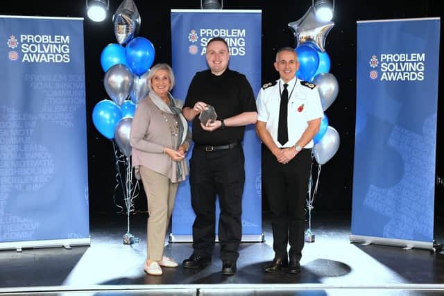 Winner of the Chenery Award, PCSO James Slater from Leyland with Sylvia Chenery and Chief Constable Chris Rowley. (Picture by Lancashire Police)