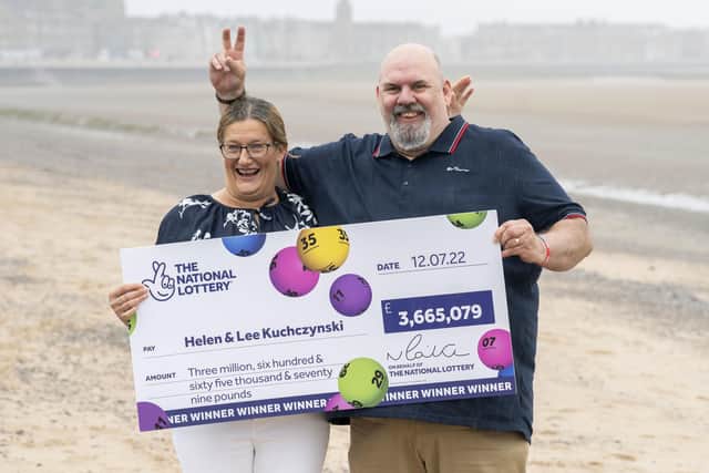 Helen and Lee Kuchczynski, from Cumbria, during a photo call to celebrate their £3.6 million EuroMillions win, in Morecambe, Lancashire. Picture date: Friday July 22, 2022. PA Photo. See PA story LOTTERY EuroMillions. Photo credit should read: Danny Lawson/PA Wire