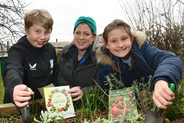 Nine-year-olds Riley McElliott and Ellie Baker are amongst the St. Stephen's pupils getting ready to grow as part of the Food for Life programme